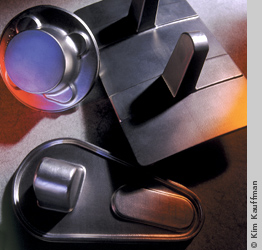 studio product photograph of forged titanium products by still life photographer kim kauffman for company brochure, web site and annual report