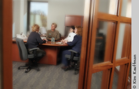 photo of executives in a conference by corporate photographer kim kauffman