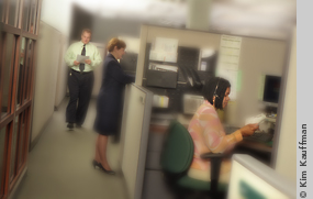 image of people at work in an office by corporate photographer kim kauffman for an annual report