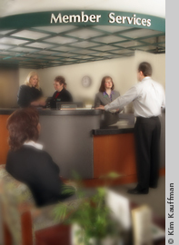 photograph of people at work by lansing, michigan photographer kim kauffman for annual report